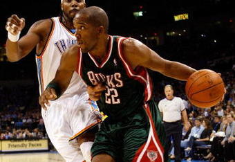 OKLAHOMA CITY - OCTOBER 29:  Michael Redd #22 of the Milwaukee Bucks drives to the basket past Chris Wilcox #54 of the Oklahoma City Thunder at the Ford Center on October 29, 2008 in Oklahoma City, Oklahoma. The Bucks won 98-87.  NOTE TO USER: User expressly acknowledges and agrees that, by downloading and/or using this Photograph, user is consenting to the terms and conditions of the Getty Images License Agreement.  (Photo by Chris Graythen/Getty Images)