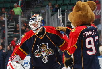 SUNRISE, FL - FEBRUARY 13: Tomas Vokoun #29 of the Florida Panthers is welcomed on to the ice by the team's mascot Stanley C. Panther prior to their game against the New York Rangers on February 13, 2009 at the BankAtlantic Center in Sunrise, Florida. (Photo by Bruce Bennett/Getty Images)