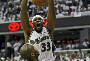 WASHINGTON - APRIL 27: Brendan Haywood #33 of the Washington Wizards slams the ball over Joe Smith #32 of the Cleveland Cavaliers in Game Four of the Eastern Conference Quarterfinals during the 2008 NBA Playoffs at the Verizon Center on April 27, 2008 in Washington, DC. The Cleveland Cavaliers won 100-97. NOTE TO USER: User expressly acknowledges and agrees that, by downloading and or using this photograph, User is consenting to the terms and conditions of the Getty Images License Agreement. (Photo by Drew Hallowell/Getty Images)