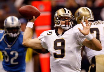 NEW ORLEANS - SEPTEMBER 13:  Quarterback Drew Brees #9 of the New Orleans Saints throws a pass against the Detroit Lions at the Louisiana Superdome on September 13, 2009 in New Orleans, Louisiana.  (Photo by Chris Graythen/Getty Images)
