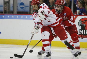 WASHINGTON - APRIL 11:  Kevin Shattenkirk #3 of the Boston Terriers tries to keep the puck from Tommy Wingels #9 of the Miami Red Hawks during the NCAA Men's Frozen Four Championship game on April 11, 2009 at the Verizon Center in Washington, DC. The Boston Terriers defeated the Miami Red Hawks 4-3 in overtime to win the national title.  (Photo by Elsa/Getty Images)