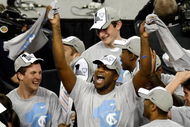 DETROIT - APRIL 06:  Mike Copeland #40 of the North Carolina Tar Heels celebrates with his teammates after defeating the Michigan State Spartans 89-72 during the 2009 NCAA Division I Men's Basketball National Championship game at Ford Field on April 6, 2009 in Detroit, Michigan.  (Photo by Gregory Shamus/Getty Images)