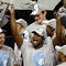 DETROIT - APRIL 06:  Mike Copeland #40 of the North Carolina Tar Heels celebrates with his teammates after defeating the Michigan State Spartans 89-72 during the 2009 NCAA Division I Men's Basketball National Championship game at Ford Field on April 6, 2009 in Detroit, Michigan.  (Photo by Gregory Shamus/Getty Images)