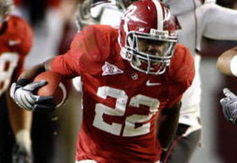 TUSCALOOSA - OCTOBER 17:  Running back Mark Ingram #22 of the Alabama Crimson Tide breaks through the line of scrimmage on a running play during the game against the South Carolina Gamecocks at Bryant-Denny Stadium on October 17, 2009 in Tuscaloosa, Alabama.  The Crimson Tide beat the Gamecocks 20-6.  (Photo by Mike Zarrilli/Getty Images)