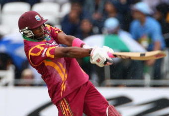 NOTTINGHAM, ENGLAND - JUNE 10:  Dwayne Bravo of West Indies hits out during the ICC World Twenty20 match between West Indies and Sri Lanka at Trent Bridge on June 10, 2009 in Nottingham, England.  (Photo by Clive Mason/Getty Images)