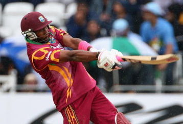 NOTTINGHAM, ENGLAND - JUNE 10:  Dwayne Bravo of West Indies hits out during the ICC World Twenty20 match between West Indies and Sri Lanka at Trent Bridge on June 10, 2009 in Nottingham, England.  (Photo by Clive Mason/Getty Images)