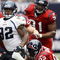HOUSTON - SEPTEMBER 27: Running back Maurice Jones-Drew #32 of the Jacksonville jaguars rushes for yardage in the fourth quarter as defensive tackle Jeff Zgonina #92 of the Houston Texans makes the tackle during the game at Reliant Stadium on September 27, 2009 in Houston, Texas. (Photo by Bob Levey/Getty Images)