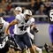 FORT WORTH, TX - OCTOBER 16:  Running back Harvey Unga #45 of the BYU Cougars runs against the TCU Horned Frogs at Amon G. Carter Stadium on October 16, 2008 in Fort Worth, Texas.  (Photo by Ronald Martinez/Getty Images)
