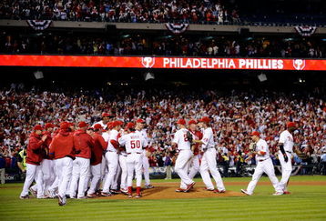 PHILADELPHIA - OCTOBER 21:  The Philadelphia Phillies celebrate defeating the Los Angeles Dodgers 10-4 to advance to the World Series in Game Five of the NLCS during the 2009 MLB Playoffs at Citizens Bank Park on October 21, 2009 in Philadelphia, Pennsylvania.  (Photo by Jeff Zelevansky/Getty Images)
