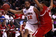 PORTLAND, OR - MARCH 19:  Demetri McCamey #32 of the Illinois Fighting Illini drives on A.J. Slaughter #4 in the first half during the first round of the NCAA Division I Men's Basketball Tournament at the Rose Garden on March 19, 2009 in Portland, Oregon.  (Photo by Jonathan Ferrey/Getty Images)