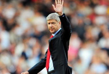 LONDON, ENGLAND - SEPTEMBER 26:  Arsenal Manager Arsene Wenger waves to the fans prior to the Barclays Premier League match between Fulham and Arsenal at Craven Cottage on September 26, 2009 in London, England.  (Photo by Mike Hewitt/Getty Images)