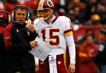 LANDOVER, MD - OCTOBER 18:  Washington Redskins head coach Jim Zorn talks with quarterback Todd Collins #15 during their game against the Kansas Chiefs October 18, 2009 at FedEx Field in Landover, Maryland. The Chiefs won the game 14-6.  (Photo by Win McNamee/Getty Images)