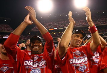 PHILADELPHIA - OCTOBER 21: (L-R) Pedro Martinez #45 and Raul Ibanez #29 of the Philadelphia Phillies celebrate on the field after their 10-4 win against the Los Angeles Dodgers in Game Five of the NLCS during the 2009 MLB Playoffs at Citizens Bank Park on October 21, 2009 in Philadelphia, Pennsylvania.  (Photo by Chris McGrath/Getty Images)