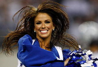 ARLINGTON, TX - SEPTEMBER 20:  A Dallas Cowboys Cheerleader performs at Cowboys Stadium on September 20, 2009 in Arlington, Texas.  (Photo by Ronald Martinez/Getty Images)