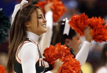 NORTH LITTLE ROCK, AR - MARCH 23:  A Miami Hurricanes cheerleader performs during a break against the Texas Longhorns during the second round of the South Regional as part of the 2008 NCAA Men's Basketball Tournament at Alltel Arena on March 23, 2008 in North Little Rock, Arkansas.  (Photo by Andy Lyons/Getty Images)