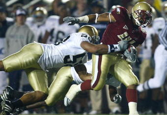 CHESTNUT HILL, MA - NOVEMBER 8: Montel Harris #41 of the Boston College Eagles gain yardage against Brian Smith #58 of the Notre Dame Fighting Irish on November 8, 2008 at Alumni Stadium in Chestnut Hill, Massachusetts.(Photo by Jim Rogash/Getty Images)