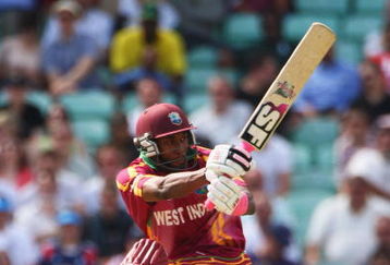 LONDON, ENGLAND - JUNE 13: Dwayne Bravo of West Indies hits out during the ICC World Twenty20 Super Eights match between South Africa and West Indies at The Brit Oval on June 13, 2009 in London, England.  (Photo by Julian Herbert/Getty Images)