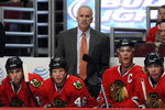 CHICAGO - OCTOBER 21: Head coach Joel Quenneville of the Chicago Blackhawks watches as his team takes on the Vancouver Canucks at the United Center on October 14, 2009 in Chicago, Illinois. The Canucks defeated the Blackhawks 3-2. (Photo by Jonathan Daniel/Getty Images)