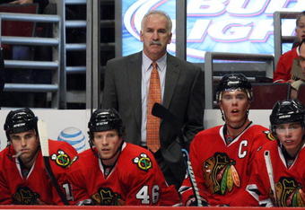 CHICAGO - OCTOBER 21: Head coach Joel Quenneville of the Chicago Blackhawks watches as his team takes on the Vancouver Canucks at the United Center on October 14, 2009 in Chicago, Illinois. The Canucks defeated the Blackhawks 3-2. (Photo by Jonathan Daniel/Getty Images)