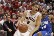 TORONTO, ON - APRIL 26:  Jose Calderon #8 of the Toronto Raptors drives past Jameer Nelson #14 of the Orlando Magic in Game Four of the Eastern Conference Quarterfinals at the Air Canada Centre April 26, 2008 in Toronto, Ontario. The Magic defeated the Raptors 106-94 to take a 3-1 series lead.  (Photo by Claus Andersen/Getty Images)