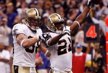 NEW ORLEANS - OCTOBER 18:  Mike Bell #21 and Jeremy Shockey #88 of the New Orleans Saints celebrate after Bell scores a touchdown against the New York Giants at the Louisiana Superdome on October 18, 2009 in New Orleans, Louisiana.  (Photo by Chris Graythen/Getty Images)