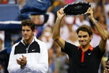 NEW YORK - SEPTEMBER 14:  (L-R) Juan Martin Del Potro of Argentina and Roger Federer of Switzerland pose with their trophies after the Men's Singles final on day fifteen of the 2009 U.S. Open at the USTA Billie Jean King National Tennis Center on September 14, 2009 in the Flushing neighborhood of the Queens borough of New York City. Del Potro defeated Federer 3-6, 7-6 (7), 4-6, 7-6 (7), 6-2.  (Photo by Clive Brunskill/Getty Images)