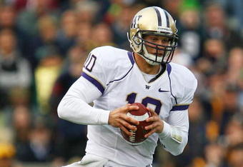 SOUTH BEND, IN - OCTOBER 03: Jake Locker #10 of the Washington Huskies runs runs against the Notre Dame Fighting Irish on October 3, 2009 at Notre Dame Stadium in South Bend, Indiana. Notre Dame defeated Washington 37-30. (Photo by Jonathan Daniel/Getty Images)