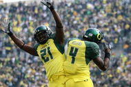 EUGENE, OR - OCTOBER 13:  Jaison Williams #4 of the Oregon Ducks celebrates with Garren Strong #21 after scoring a touchdown against the Washington State Cougars at Autzen Stadium October 13, 2007 in Eugene, Oregon.  (Photo by Jonathan Ferrey/Getty Images)