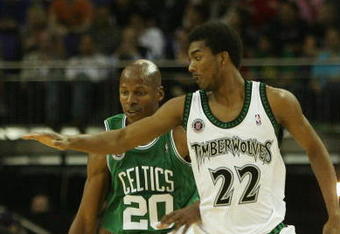 LONDON - OCTOBER 10: Ray Allen #20 of Boston is challenged by Corey Brewer #22 of Minnesota during NBA Europe Live 2007 Tour match between the Boston Celtics and the Minnesota Timberwolves at the O2 Arena on October 10, 2007 in London, England.  NOTE TO USER: User expressly acknowledges and agrees that, by downloading and or using this Photograph, user is consenting to the terms and conditions of the Getty Images License Agreement.  (Photo by Bryn Lennon/Getty Images)