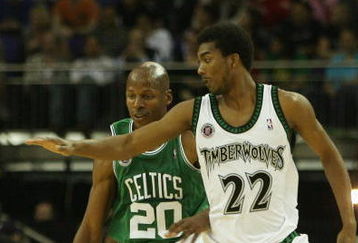 LONDON - OCTOBER 10: Ray Allen #20 of Boston is challenged by Corey Brewer #22 of Minnesota during NBA Europe Live 2007 Tour match between the Boston Celtics and the Minnesota Timberwolves at the O2 Arena on October 10, 2007 in London, England.  NOTE TO USER: User expressly acknowledges and agrees that, by downloading and or using this Photograph, user is consenting to the terms and conditions of the Getty Images License Agreement.  (Photo by Bryn Lennon/Getty Images)