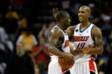 CHARLOTTE, NC - MARCH 31:  Teammates Raja Bell #19 and Raymond Felton #20 of the Charlotte Bobcats react after a play during their game against the Los Angeles Lakers at Time Warner Cable Arena on March 31, 2009 in Charlotte, North Carolina.  NOTE TO USER: User expressly acknowledges and agrees that, by downloading and/or using this Photograph, user is consenting to the terms and conditions of the Getty Images License Agreement.  (Photo by Streeter Lecka/Getty Images)