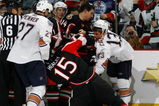 OTTAWA - MARCH 5:  Dustin Penner #27 of the Edmonton Oilers pulls Dany Heatley #15 of the Ottawa Senators off his skates during a melee late in the third period of a game on March 5, 2009 at the Scotiabank Place in Ottawa, Canada. The Ottawa Senators defeated the Edmonton Oilers 4-2. (Photo by Phillip MacCallum/Getty Images)