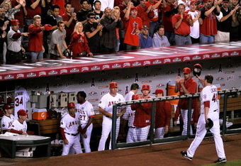ANAHEIM, CA - OCTOBER 22:  John Lackey #41 of the Los Angeles Angels of Anaheim acknowledges the crown during the seventh inning in Game Five of the ALCS against the New York Yankees during the 2009 MLB Playoffs at Angel Stadium on October 22, 2009 in Anaheim, California.  (Photo by Harry How/Getty Images)