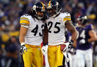 BALTIMORE - DECEMBER 14:  Ryan Clark #25 of the Pittsburgh Steelers celebrates his interception against the Baltimore Ravens with teammate Troy Polamalu #43 on December 14, 2008 at M&T Bank Stadium in Baltimore, Maryland.  (Photo by Jim McIsaac/Getty Images)
