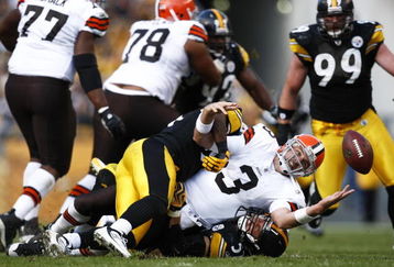 PITTSBURGH, PA - OCTOBER 18: Derek Anderson #3 of the Cleveland Browns fumbles the football after being sacked by James Farrior #51 of the Pittsburgh Steelers at Heinz Field on October 18, 2009 in Pittsburgh, Pennsylvania. The Steelers defeated the Browns 27-14. (Photo by Joe Robbins/Getty Images)