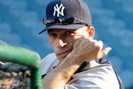 ANAHEIM, CA - OCTOBER 22:  Manager Joe Girardi of the New York Yankees watches batting practice prior to the start of Game Five of the ALCS against the Los Angeles Angels of Anaheim during the 2009 MLB Playoffs at Angel Stadium on October 22, 2009 in Anaheim, California.  (Photo by Jeff Gross/Getty Images)