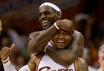CLEVELAND - MAY 20:  Mo Williams #2 and LeBron James #23 of the Cleveland Cavaliers celebrate after Williams made a three pointer at the end of the first half against the Orlando Magic in Game One of the Eastern Conference Finals during the 2009 Playoffs at Quicken Loans Arena on May 20, 2009 in Cleveland, Ohio. NOTE TO USER: User expressly acknowledges and agrees that, by downloading and or using this photograph, User is consenting to the terms and conditions of the Getty Images License Agreement  (Photo by Elsa/Getty Images)