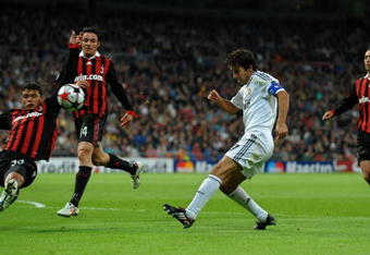 MADRID, SPAIN - OCTOBER 21:  Raul Gonzalez (2nd R) of Real Madrid shoots on goal in between AC Milan players Alessandro Nesta (R), Thiago Silva (L) and Massimo Oddo during the Champions League group C match between Real Madrid and AC Milan at the Estadio Santiago Bernabeu on October 21, 2009 in Madrid, Spain. AC Milan won the match 3-2.  (Photo by Jasper Juinen/Getty Images)