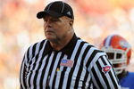 GAINESVILLE, FL - OCTOBER 17: SEC umpire Ronnie Jones watches play as the Florida Gators host the Arkansas Razorbacks October 17, 2009 at Ben Hill Griffin Stadium in Gainesville, Florida.  (Photo by Al Messerschmidt/Getty Images)