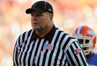 GAINESVILLE, FL - OCTOBER 17: SEC umpire Ronnie Jones watches play as the Florida Gators host the Arkansas Razorbacks October 17, 2009 at Ben Hill Griffin Stadium in Gainesville, Florida.  (Photo by Al Messerschmidt/Getty Images)