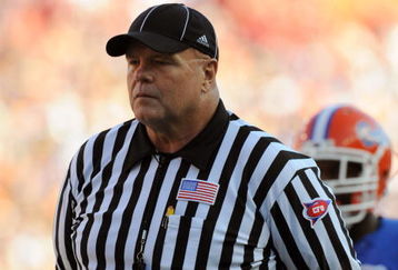 GAINESVILLE, FL - OCTOBER 17: SEC umpire Ronnie Jones watches play as the Florida Gators host the Arkansas Razorbacks October 17, 2009 at Ben Hill Griffin Stadium in Gainesville, Florida.  (Photo by Al Messerschmidt/Getty Images)