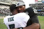 OAKLAND, CA - OCTOBER 18:  Michael Vick #7 of the Philadelphia Eagles talks with JaMarcus Russell #2 of the Oakland Raiders at the end of an NFL game at the Oakland-Alameda County Coliseum on October 18, 2009 in Oakland, California.  (Photo by Jed Jacobsohn/Getty Images)