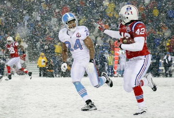 FOXBORO, MA - OCTOBER 18:  BenJarvis Green-Ellis #42 of the New England Patriots carries the ball as Chris Hope #24 of the Tennessee Titans defends on October 18, 2009 at Gillette Stadium in Foxboro, Massachusetts. The Patriots defeated the Titans 59-0.  (Photo by Elsa/Getty Images)