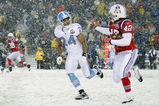 FOXBORO, MA - OCTOBER 18:  BenJarvis Green-Ellis #42 of the New England Patriots carries the ball as Chris Hope #24 of the Tennessee Titans defends on October 18, 2009 at Gillette Stadium in Foxboro, Massachusetts. The Patriots defeated the Titans 59-0.  (Photo by Elsa/Getty Images)