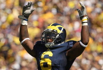 ANN ARBOR, MI - SEPTEMBER 19:  Cornerback Donovan Warren #6 of the Michigan Wolverines exhorts the crowd in the game with the Eastern Michigan Eagles at Michigan Stadium on September 19, 2009 in Ann Arbor, Michigan.  Michigan won 45-17.  (Photo by Stephen Dunn/Getty Images)