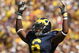 ANN ARBOR, MI - SEPTEMBER 19: Cornerback Donovan Warren #6 of the Michigan Wolverines exhorts the crowd in the game with the Eastern Michigan Eagles at Michigan Stadium on September 19, 2009 in Ann Arbor, Michigan. Michigan won 45-17. (Photo by Stephen Dunn/Getty Images)