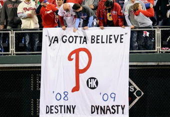 PHILADELPHIA - OCTOBER 21:  Fans celebrate the Philadelphia Phillies defeating the Los Angeles Dodgers 10-4 to advance to the World Series in Game Five of the NLCS during the 2009 MLB Playoffs at Citizens Bank Park on October 21, 2009 in Philadelphia, Pennsylvania.  (Photo by Jeff Zelevansky/Getty Images)