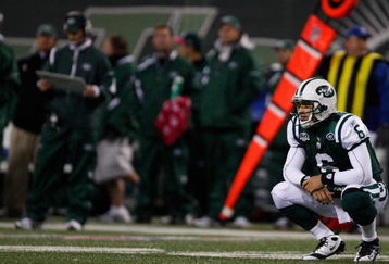 EAST RUTHERFORD, NJ - OCTOBER 18: Mark Sanchez #6 of the New York Jets crouches to the ground after throwing an interception against the Buffalo Bills during the game on October 18, 2009 at Giants Stadium in East Rutherford, New Jersey. The Bills defeated the Jets 16-13 in overtime. (Photo by Jared Wickerham/Getty Images)
