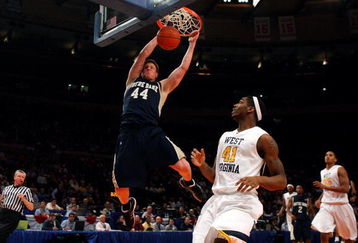 NEW YORK - MARCH 11:  Luke Harangody #44 of the Notre Dame Fighting Irish dunks the ball against the West Virginia Mountaineers during the second round of the Big East Tournament at Madison Square Garden on March 11, 2009 in New York City.  (Photo by Jim McIsaac/Getty Images)