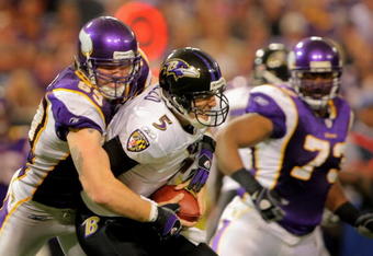 MINNEAPOLIS - OCTOBER 18:  Defensive end Jared Allen #69 of the Minnesota Vikings sacks quarterback Joe Flacco #5 of the Baltimore Ravens in the fourth quarter during NFL action at Hubert H. Humphrey Metrodome on October 18, 2009 in Minneapolis, Minnesota. The Vikings defeated the Ravens 33-31.  (Photo by Doug Pensinger/Getty Images)